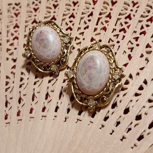 Clip on Earring very faded picture on these earrings